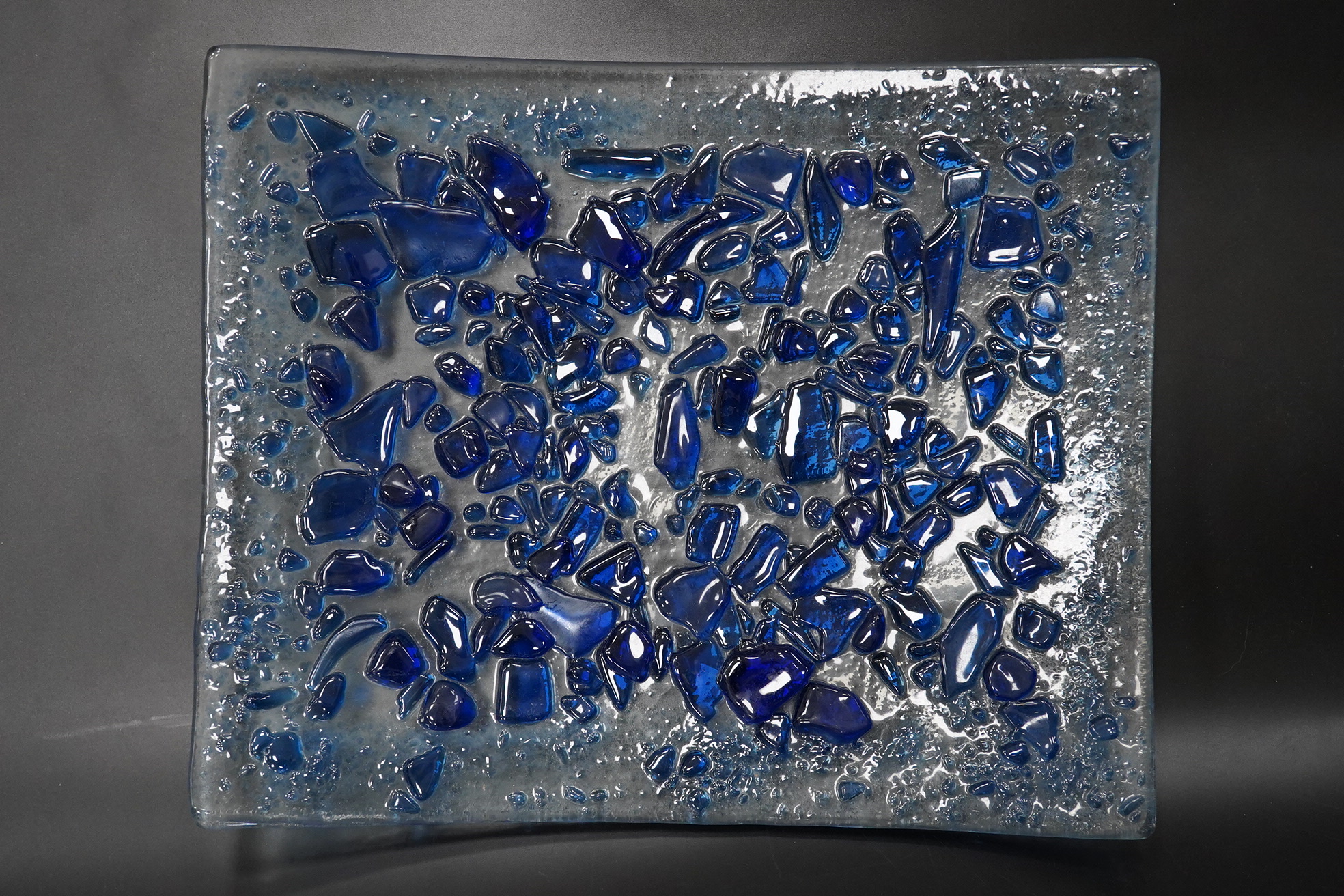 A Mary Canny shaped art glass ‘Blue Jewelled Platter’ 26.5cm x 21.5cm